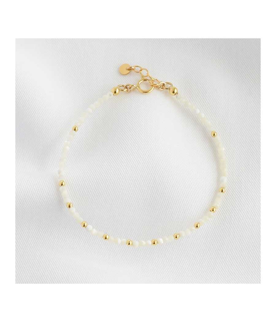 Bracelet perles blanc et or...